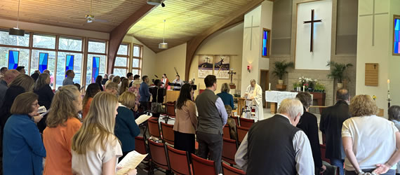 st paul congregation standing and worshiping in the sanctuary